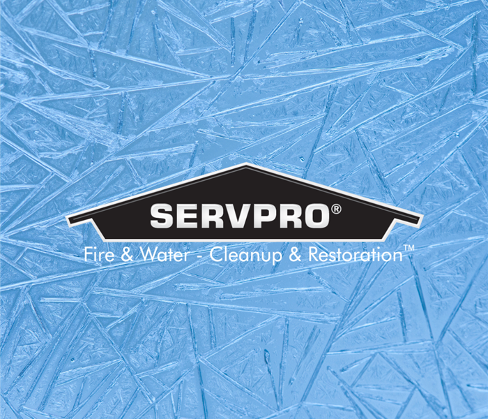 Blue, frozen ice background with a black SERVPRO logo in the center